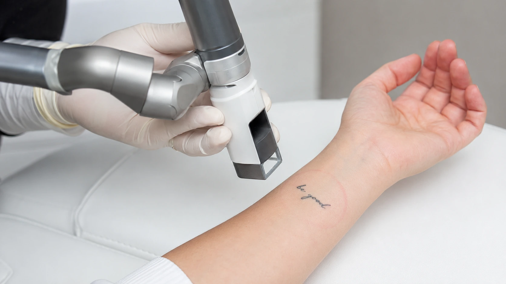 PicoSure Pro laser handpiece treating a tattoo