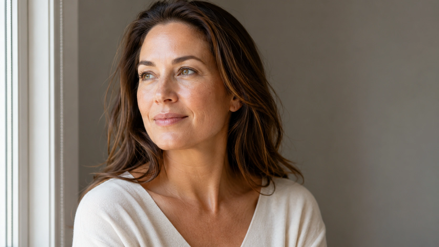 Woman with naturally refreshed-looking skin after a low-downtime laser facial