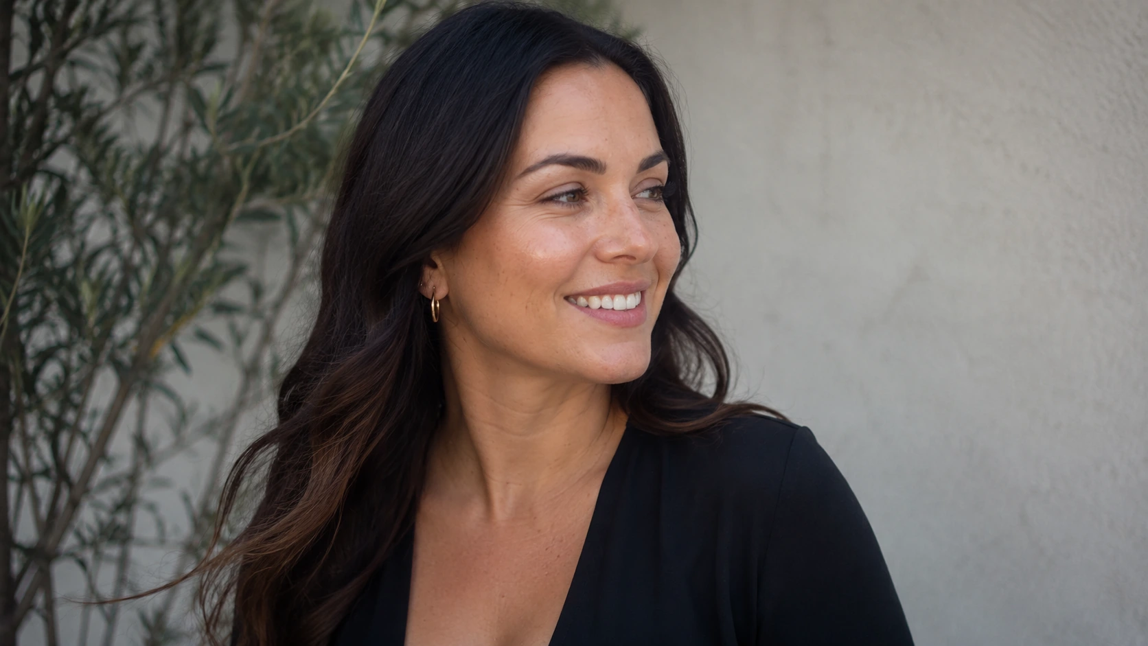 Woman with bright, even-toned skin after VI Peel recovery